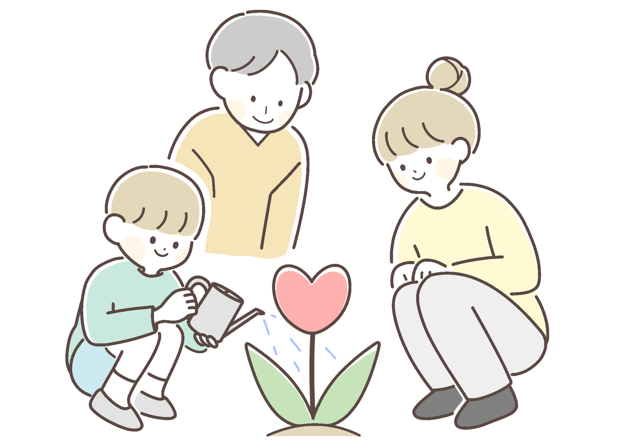 心を育てる男の子と見守る両親